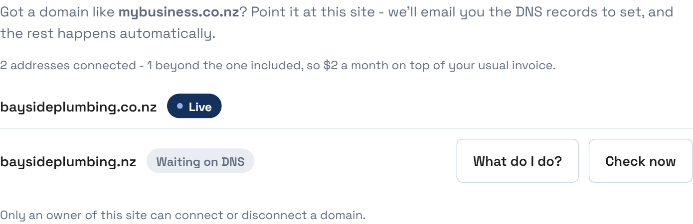 Two connected domains. The first shows a dark Live badge. The second shows a grey Waiting on DNS badge with two buttons beside it, What do I do? and Check now.